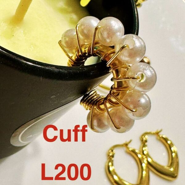 Cuff Enchapado Oro 14k con perlas y anudado con hilo de acero