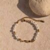 Pulsera enchapada en oro de 18k con perlas y chile de acero inoxidable ingenioso