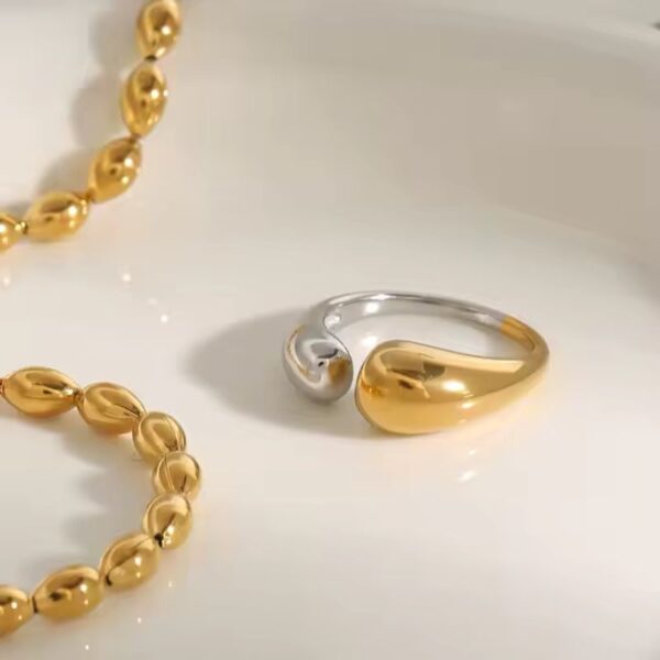 Anillo de oro enchapado 18k de acero inoxidable abertura frontal bicolor impactante