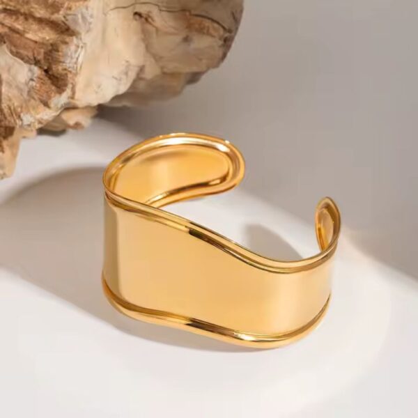 Pulseras de líneas elípticas irregulares geométricas elaboradas de acero inoxidable enchapada oro abierto de 18K fascinante