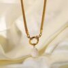 Gargantilla de Acero Inoxidable tejido snake suntuoso enchapado en18K de 5mm con perla barroca